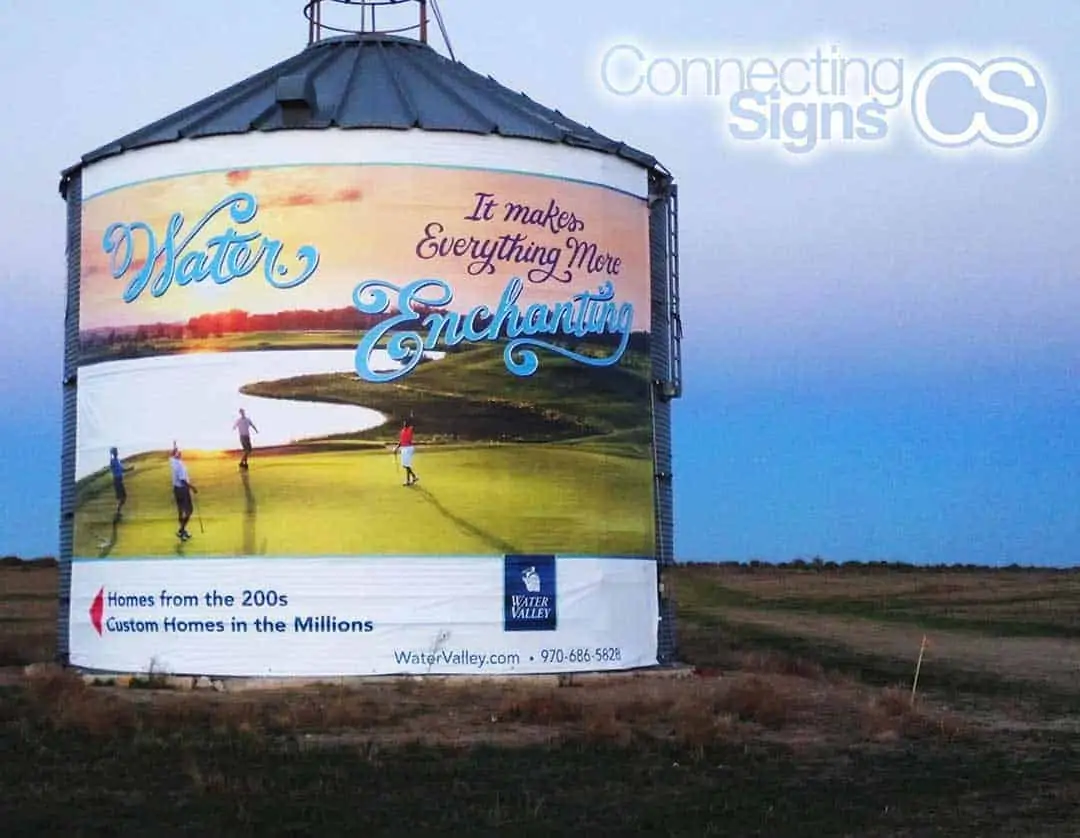 oversized giant banner advertising water valley homes for sale