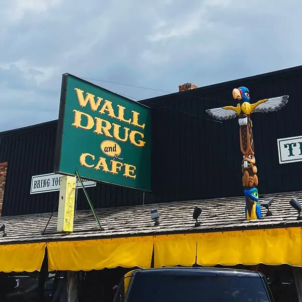 wall drug store and cafe sign