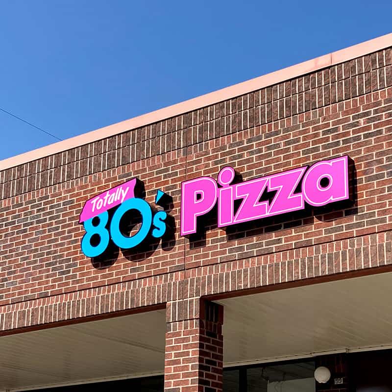 Exterior commercial signs by Connecting Signs Fort Collins - Channel letters Totally 80's Pizza